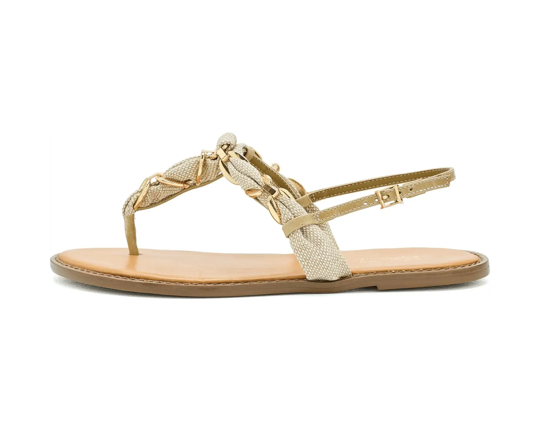 Side view of Schutz Camellia leather flats featuring a chained T-strap, open round-toe silhouette, low-profile sole, and adjustable ankle strap.