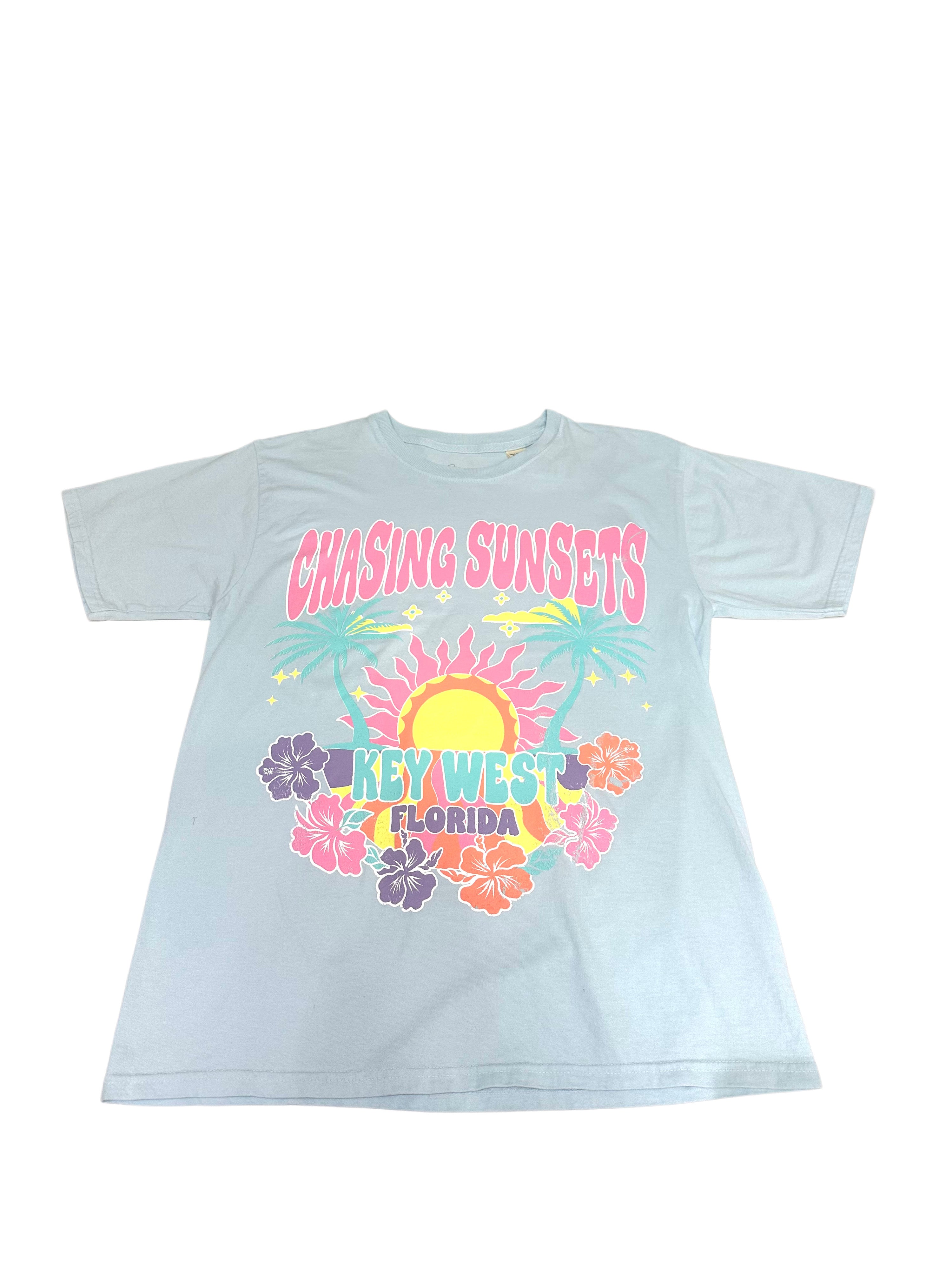 Shaddow and Fish Chasing Sunsets Key West short sleeve tee in powder blue — sunset graphic tee at Shaddow & Fish boutique