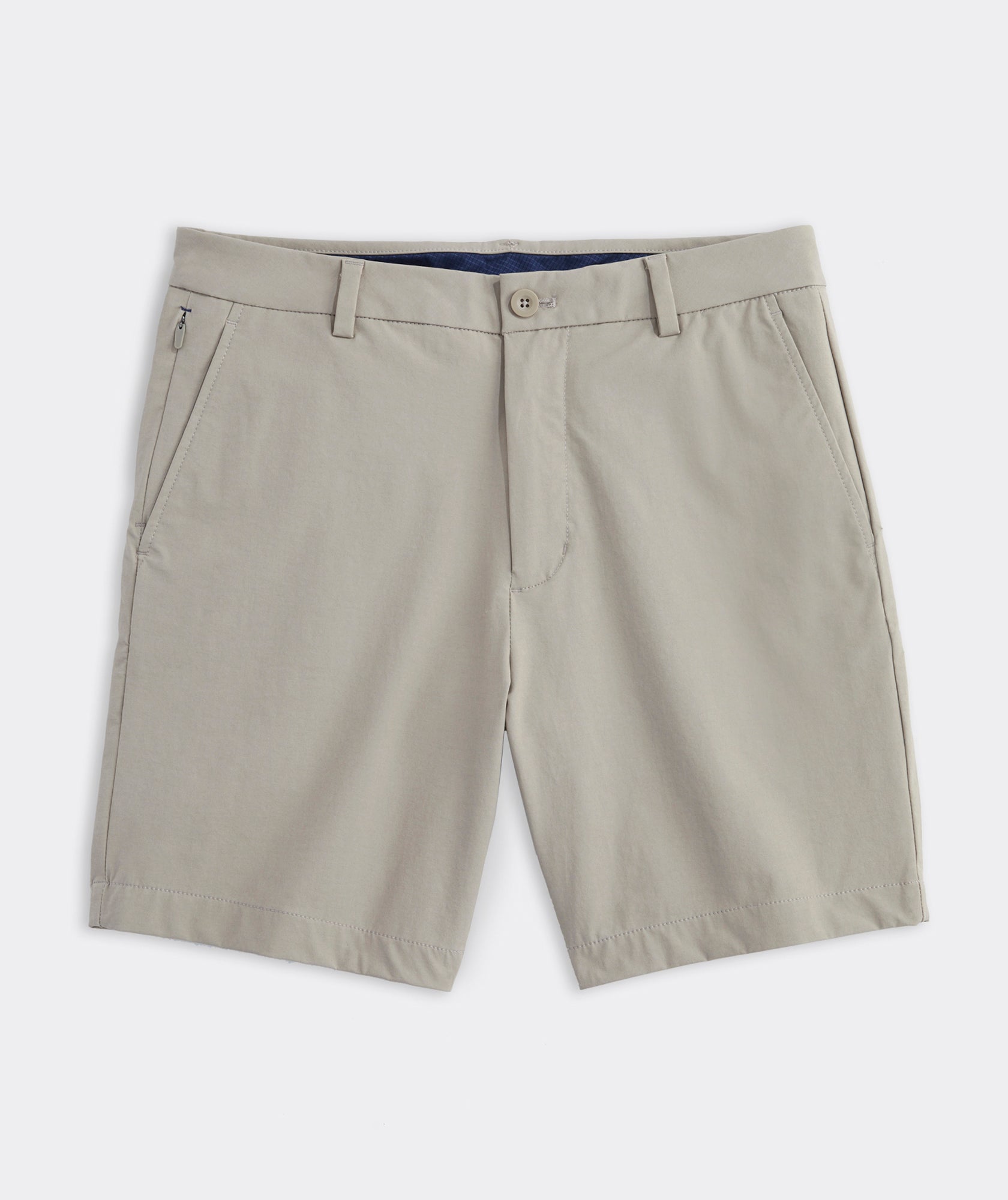 Vineyard Vines 7" On-The-Go Shorts in Khaki — moisture-wicking stretch shorts with hidden zipper pocket, available at Shaddow & Fish, Key West
